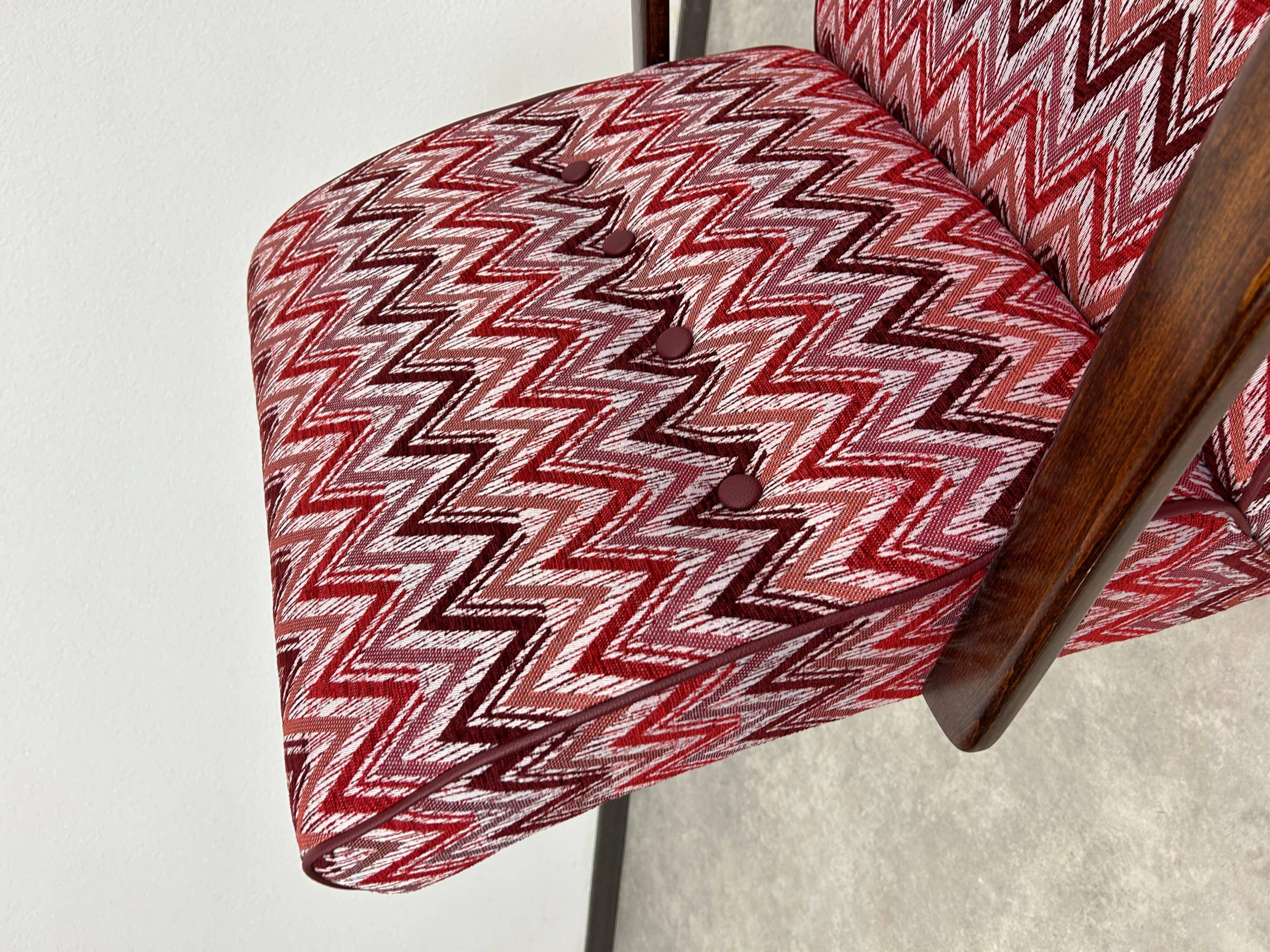 C-shaped lounge chair by J. Halabala