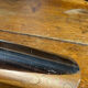 Pair of polished aluminium candlesticks
