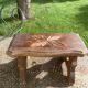 Bench in carved and varnished wood, mountain chalet decoration, old