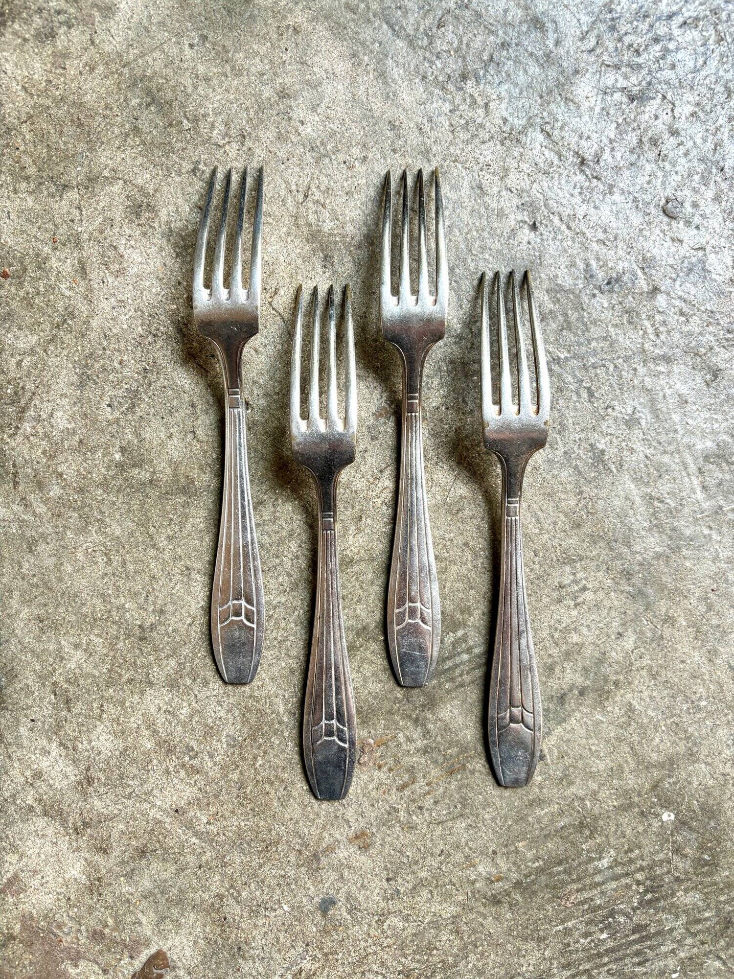 4 silver-plated forks