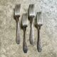 4 silver-plated forks