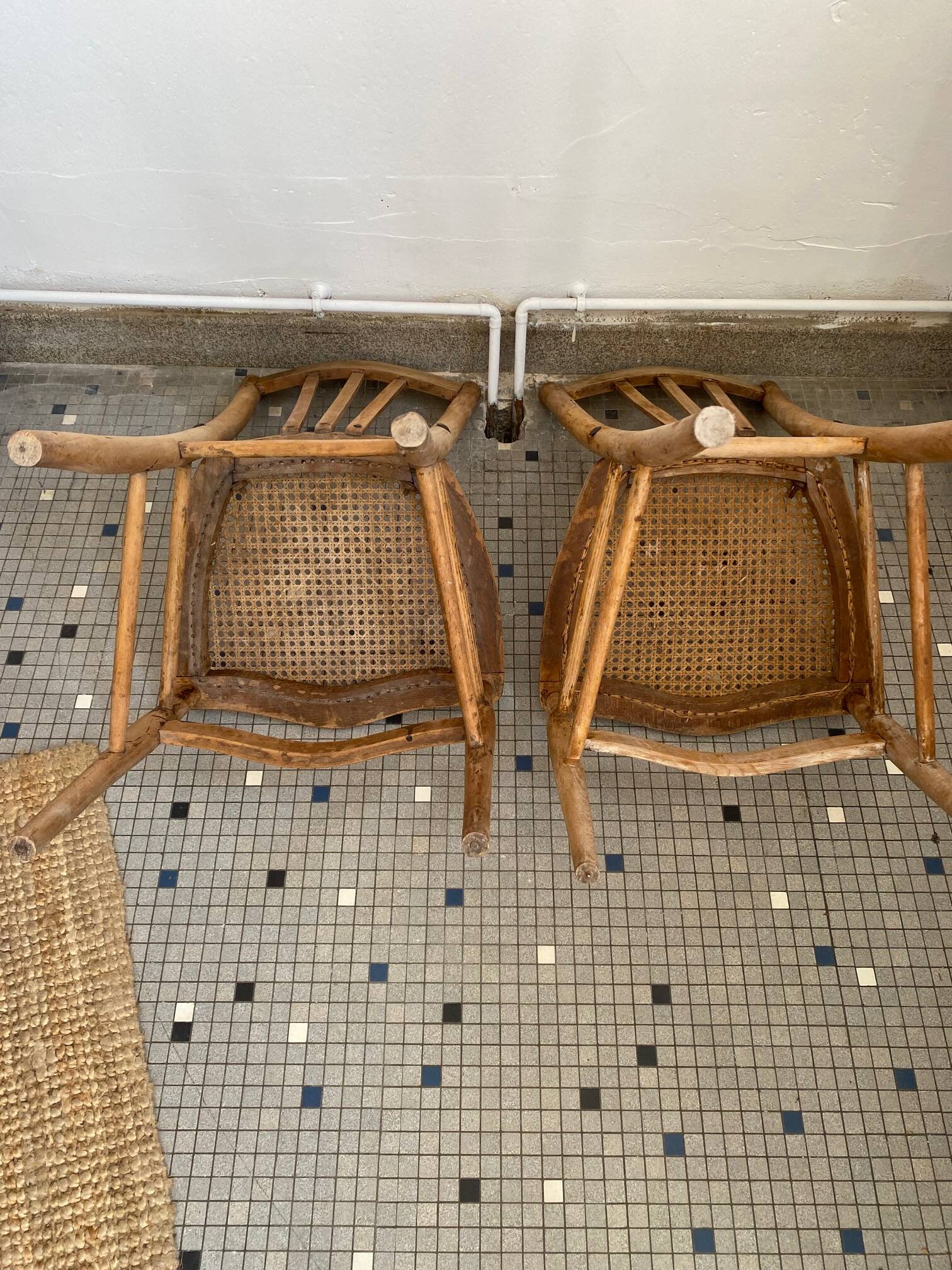 Pair of caned bistro chairs