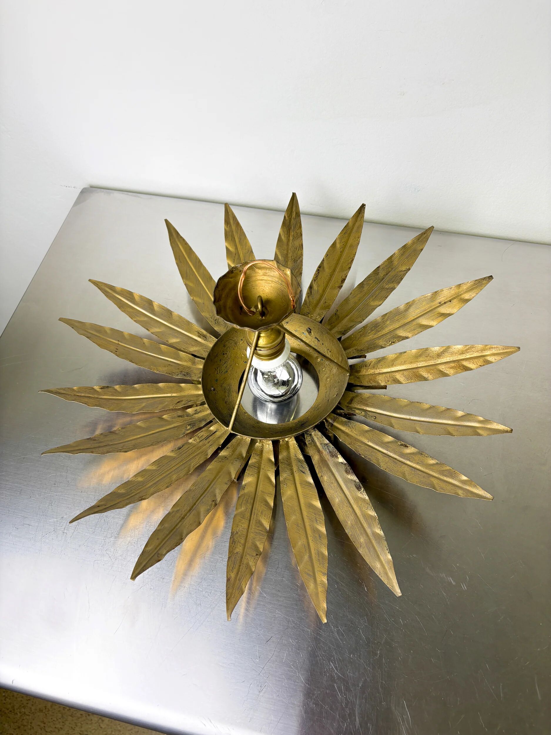 Mid-century modern sunburst light fixture with leaves, French craftsmanship, 1950s
