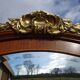 Three-door wardrobe with marquetry and bronze.