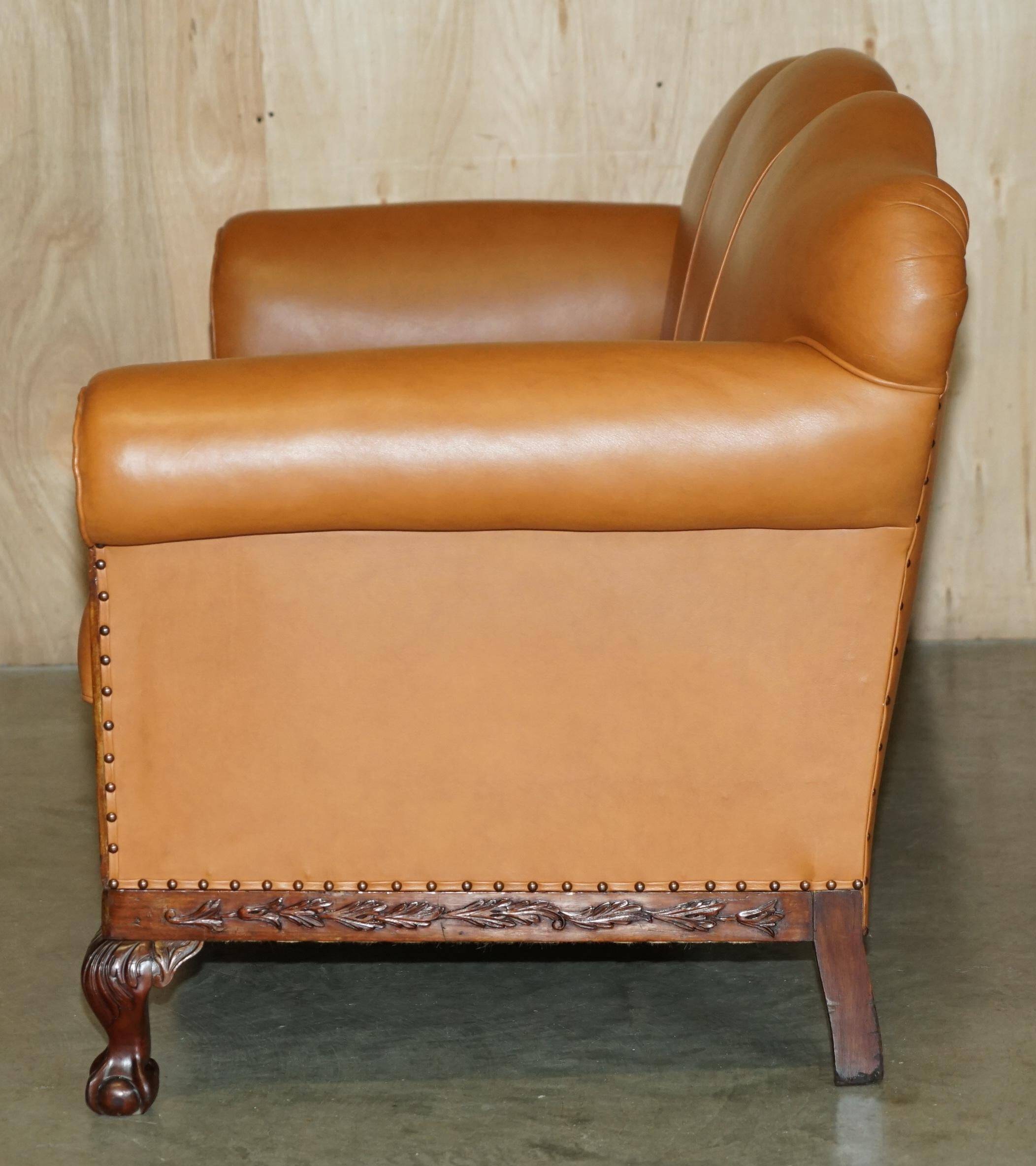 Restored three-seater leather canapé in late Victorian style.