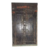 Old wooden door with frame