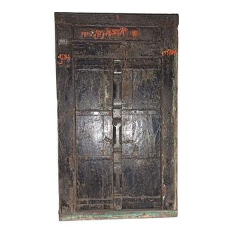 Old wooden door with frame