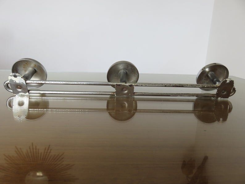 3-70s gold metal coat holder