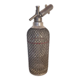 Old glass and metal siphon