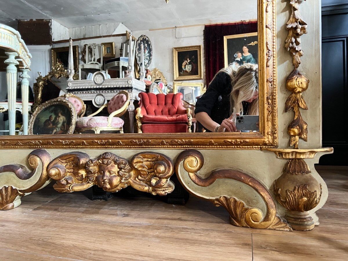 Italian mirror from the Napoleon III period in painted and gilded wood
