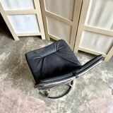 2 chairs in chromed metal and black woven skaï 1970s