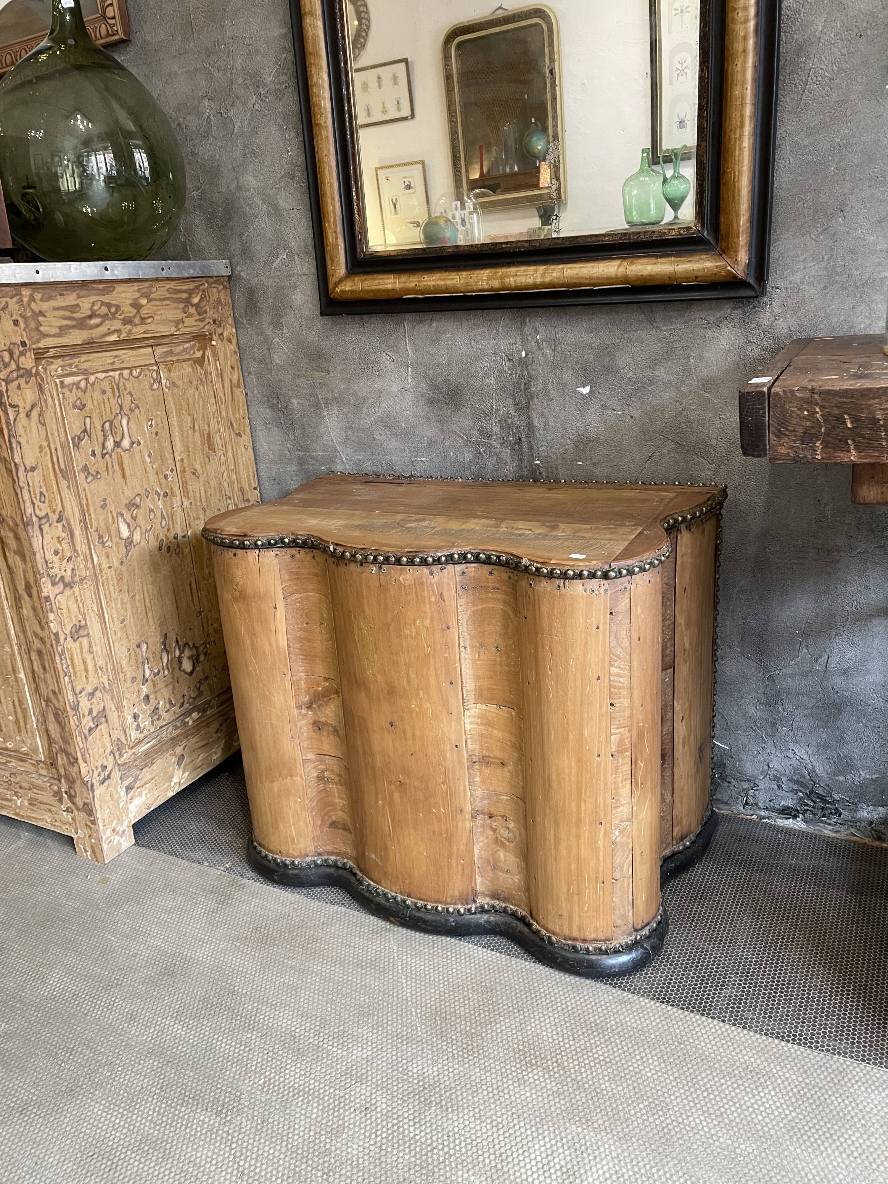 Rounded old wood chest