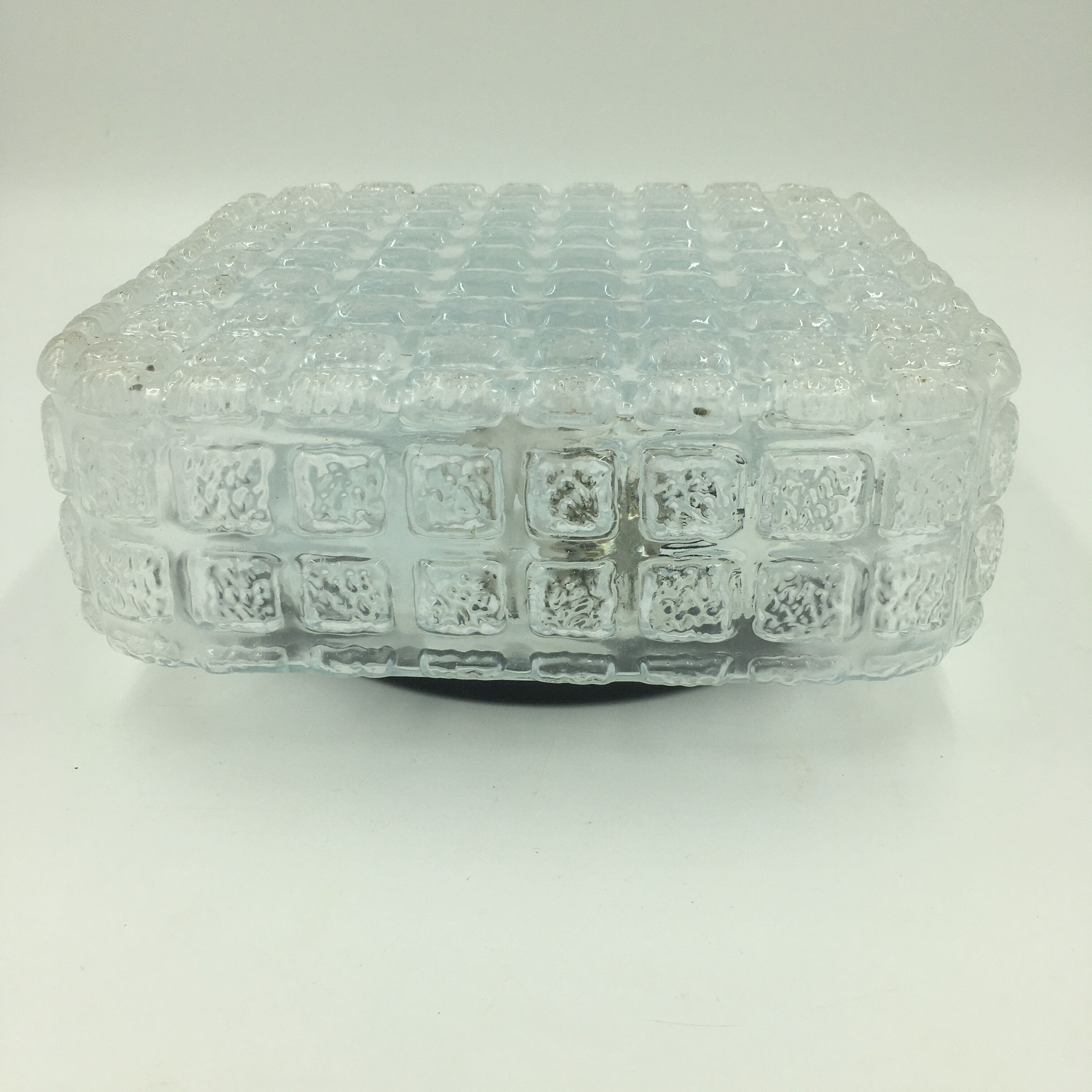 Ceiling lamp in molded glass with relief