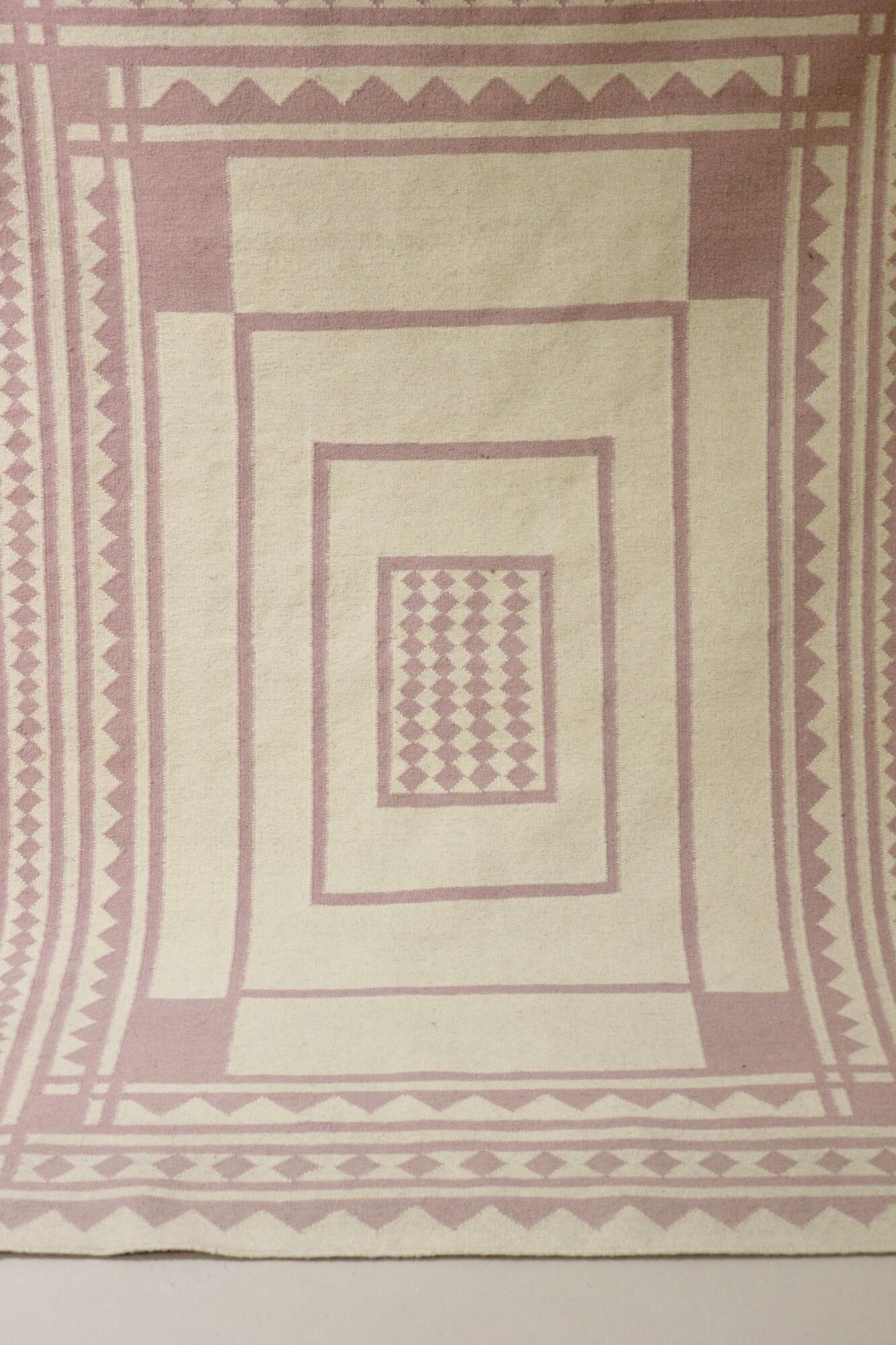 Carpet geometric design pastel colors pink and off-white year 70/80.