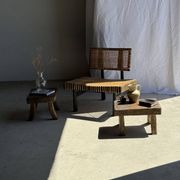 Small stool, rectangular solid teak side table with curved legs.