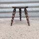 Turned wooden tripod stool