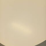 Vintage Eames round table for Vitra in white melamine, wood, and metal.