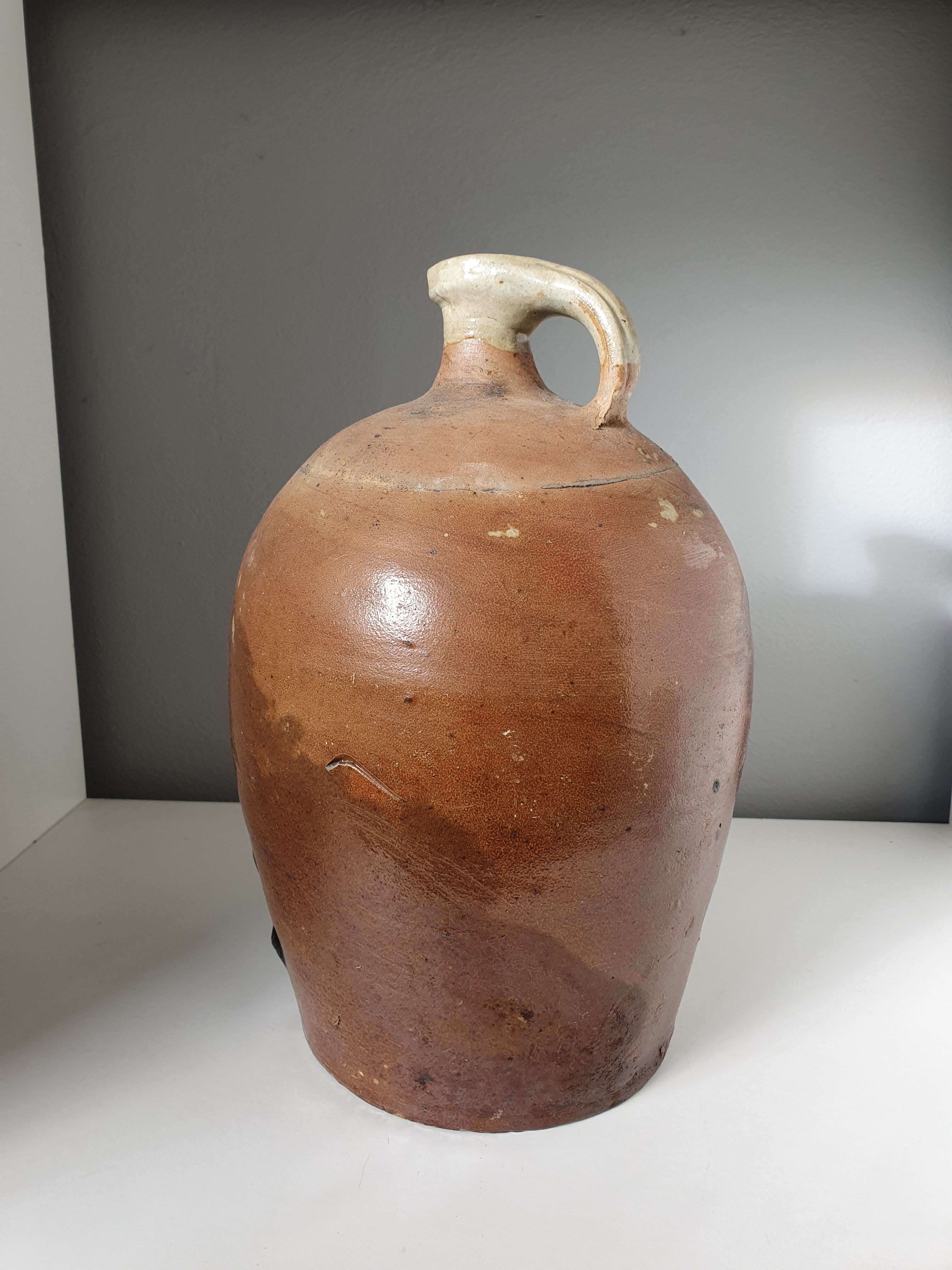 Enamelled sandstone jug