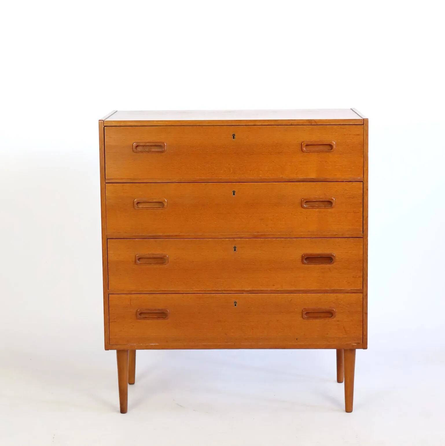 Teak chest of drawers with four drawers