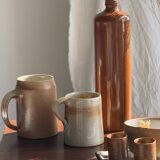 Large antique stoneware bottle with a small cork stopper