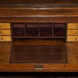 Light wood library with a secretary and leather surface.
