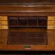Light wood library with a secretary and leather surface.