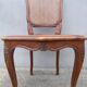 4 caned wooden chairs