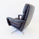 Danish black leather armchair with ottoman 70s
