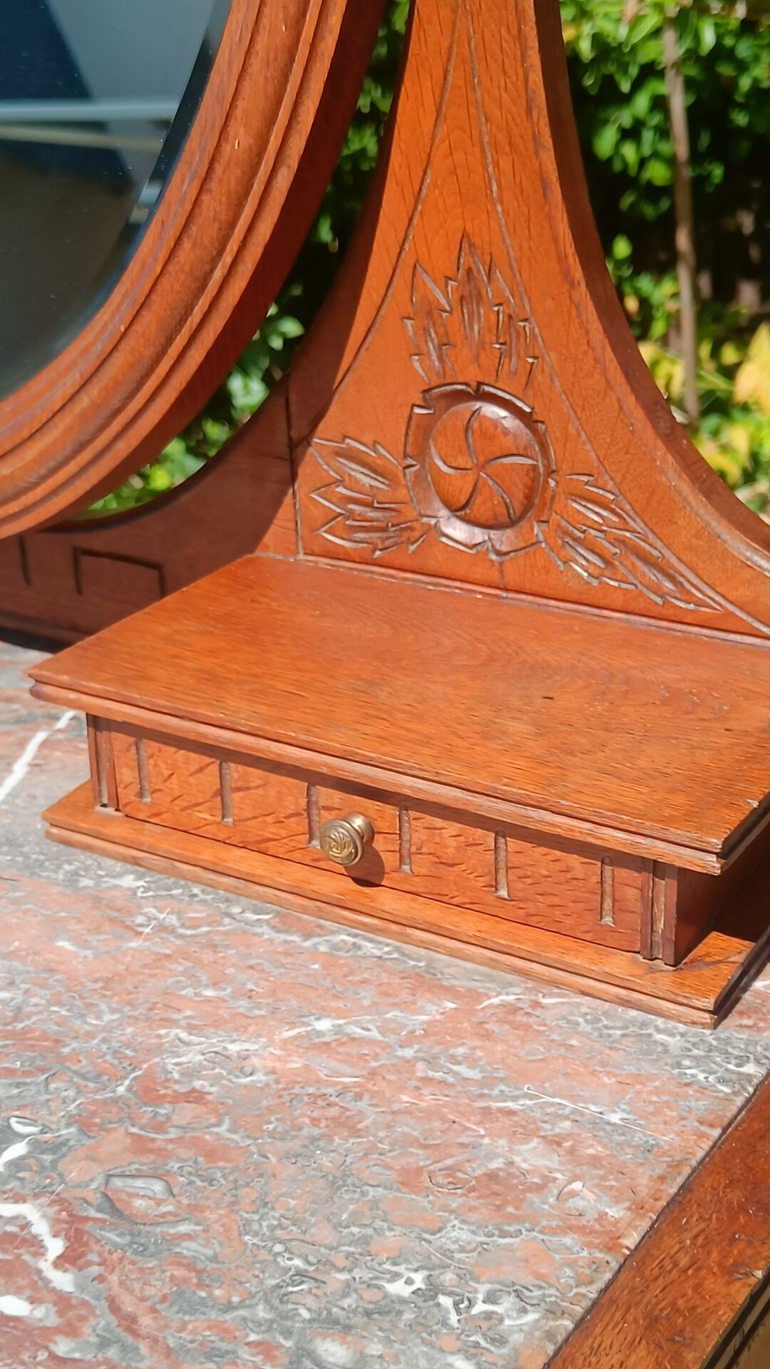 Art Deco oak dressing table, marble top and swivel mirror.