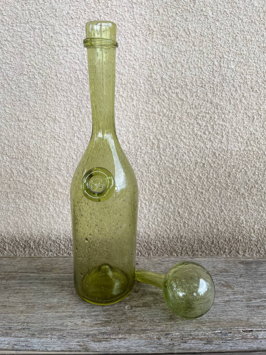 70s biot glass bottle
