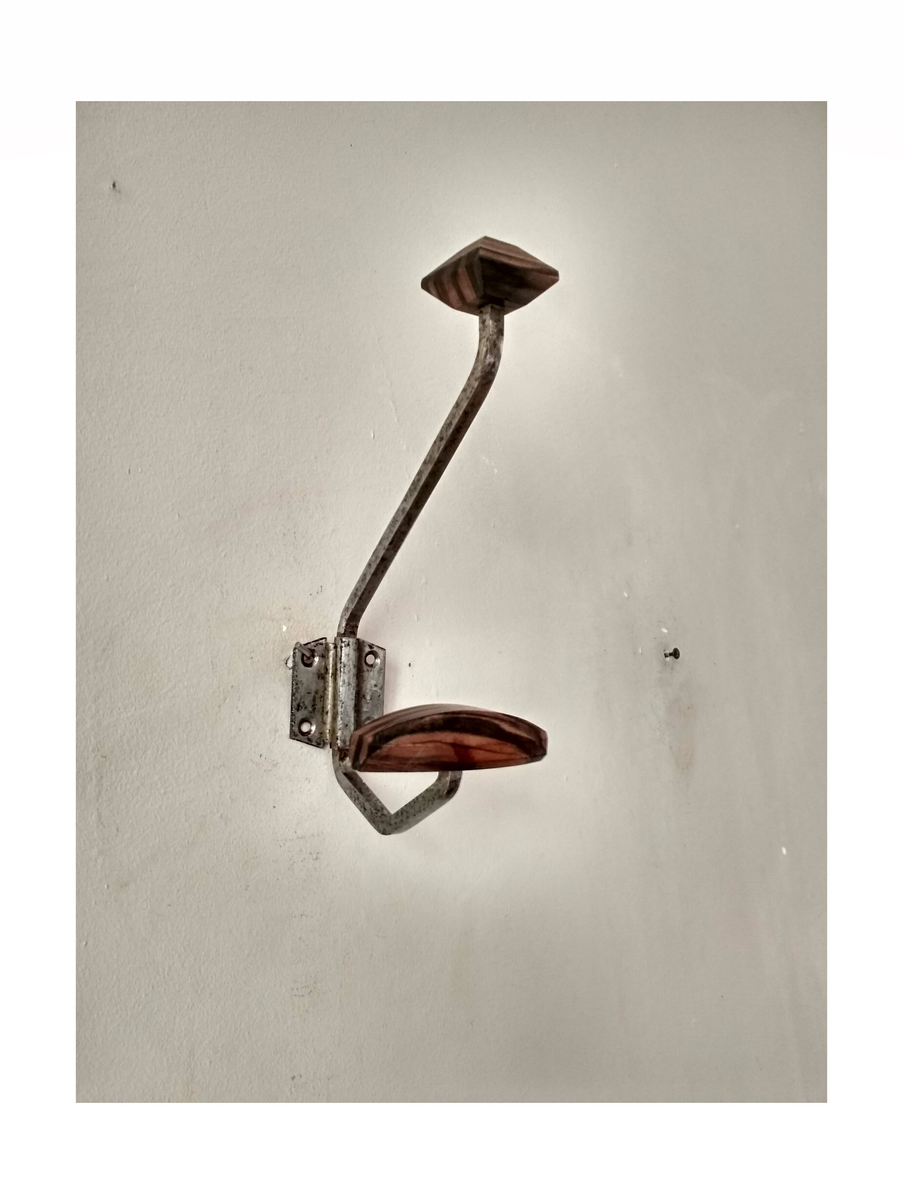Old coat rack in metal and wood