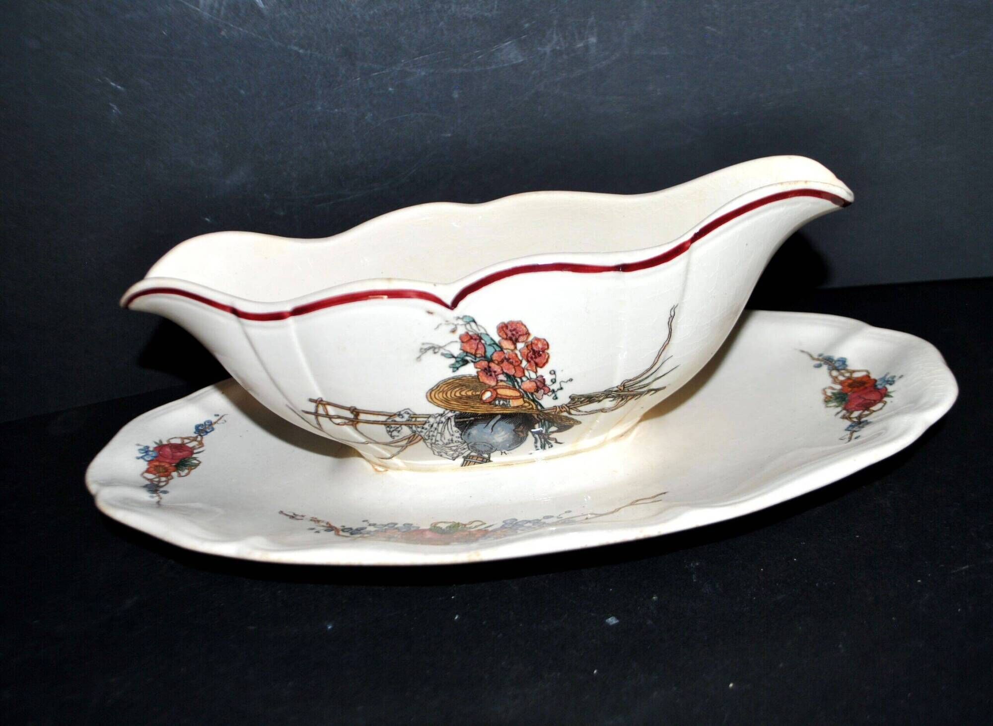 Sarreguemines sauce boat and dish in earthenware with "Obernai" decoration by Henri Loux