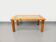 Vintage modernist coffee table in pine and glass from the 70s and 80s.