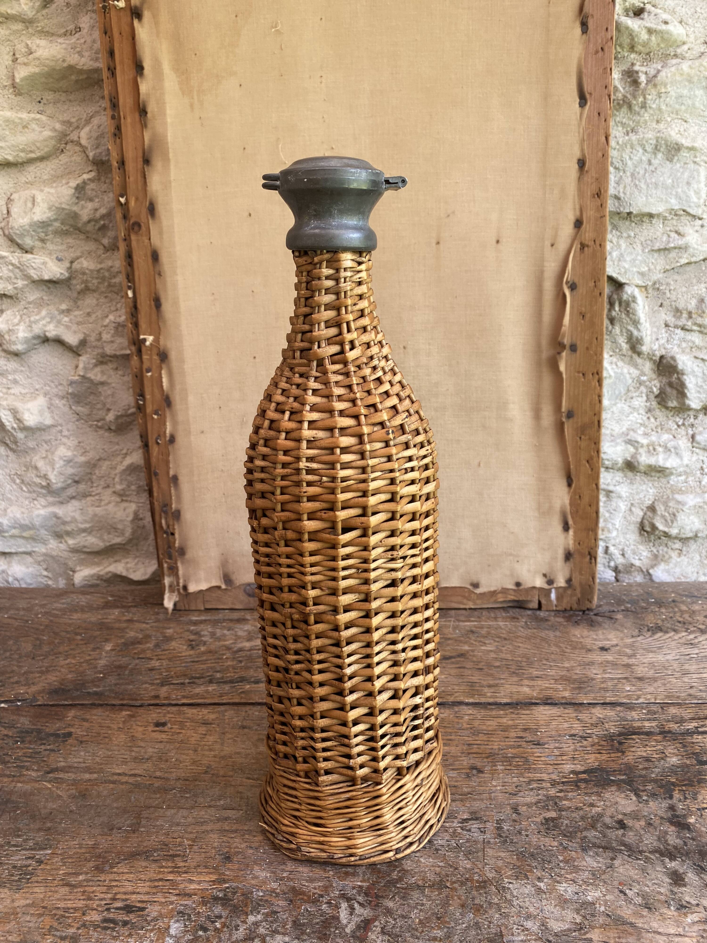 Woven wicker bottle
