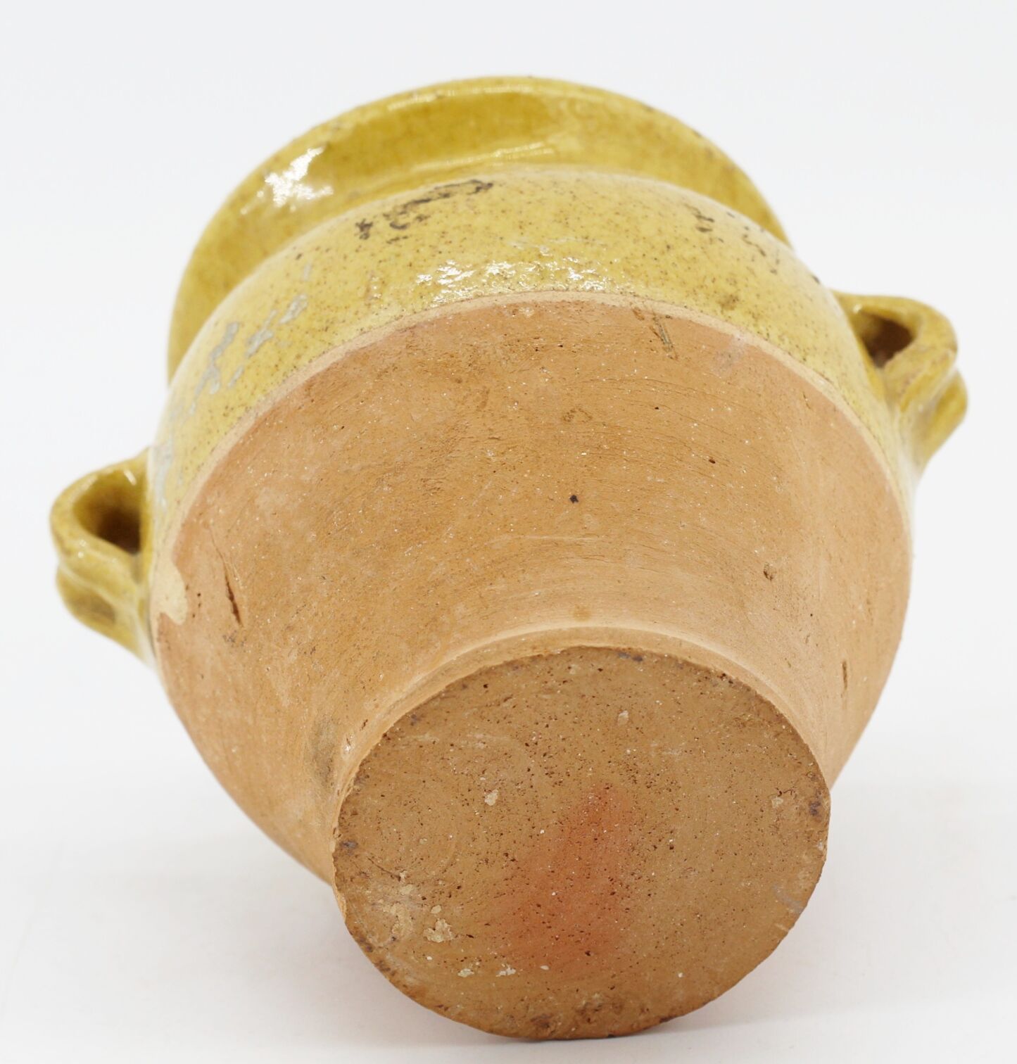 Ancient ochre earth pot