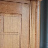 Vintage wooden wardrobe with sliding doors.