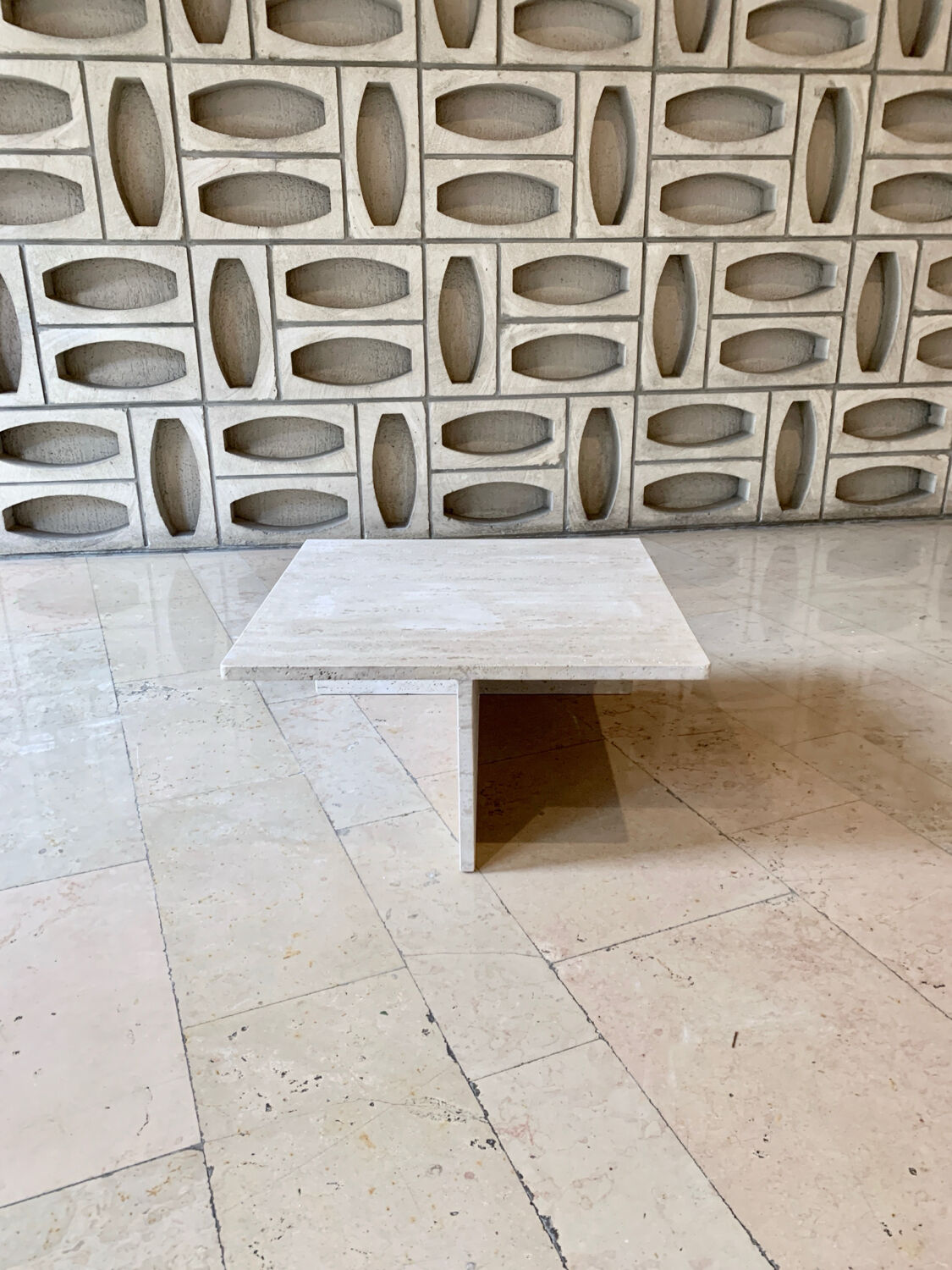 Square travertine coffee table by Giusti and Di Rosa for UP&UP