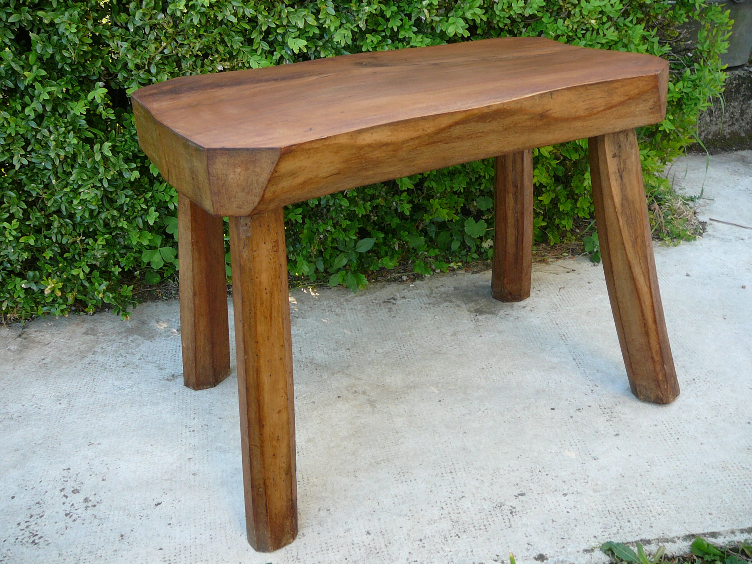 Free-form brutalist massive walnut side table