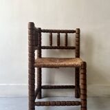 Corner straw chair "fireplace corner" in turned and beaded wood