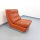 Vintage Roche Bobois armchair in chrome and terracotta leather.