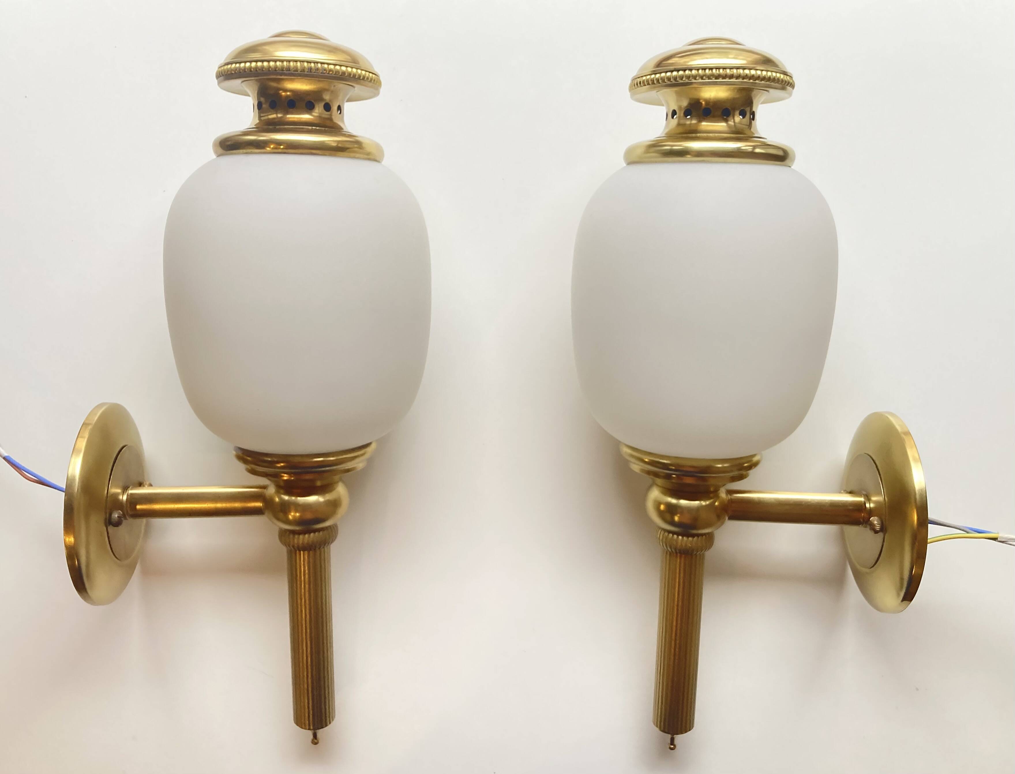 Set of two Sciolari wall lights.