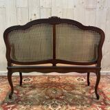 Louis XV mahogany and cane bench
