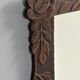 Arts & Crafts hand-carved wall mirror with floral roses, early 20th century