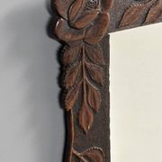 Arts & Crafts hand-carved wall mirror with floral roses, early 20th century