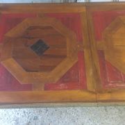 Coffee table with storage for bottles and glasses in oak.