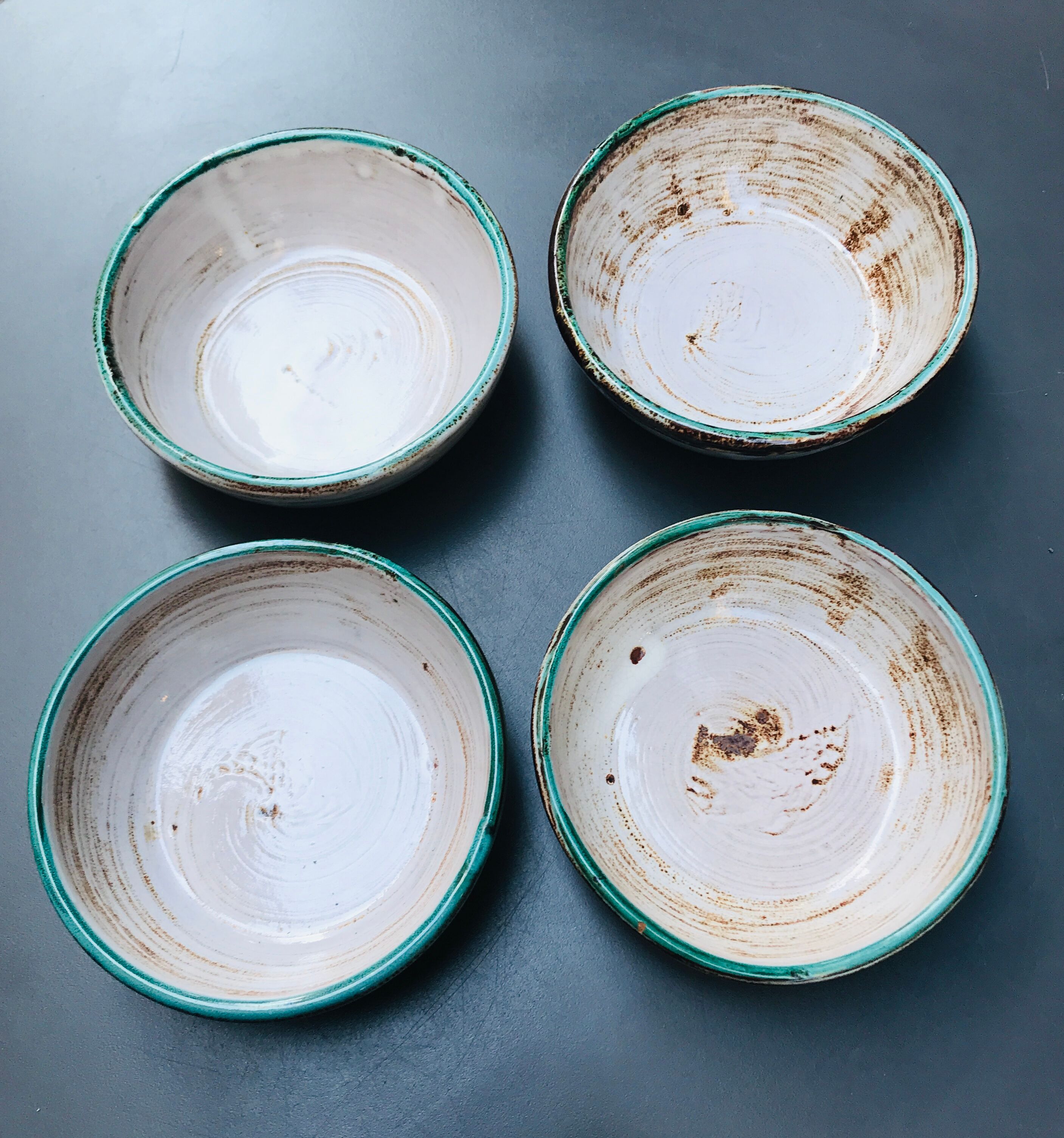 Set of 4 enamelled earth cups