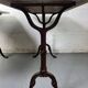 Set of two bistro tables in marble and wrought iron