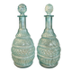 Pair of cut blown glass carafes in blue-green from the 19th century.