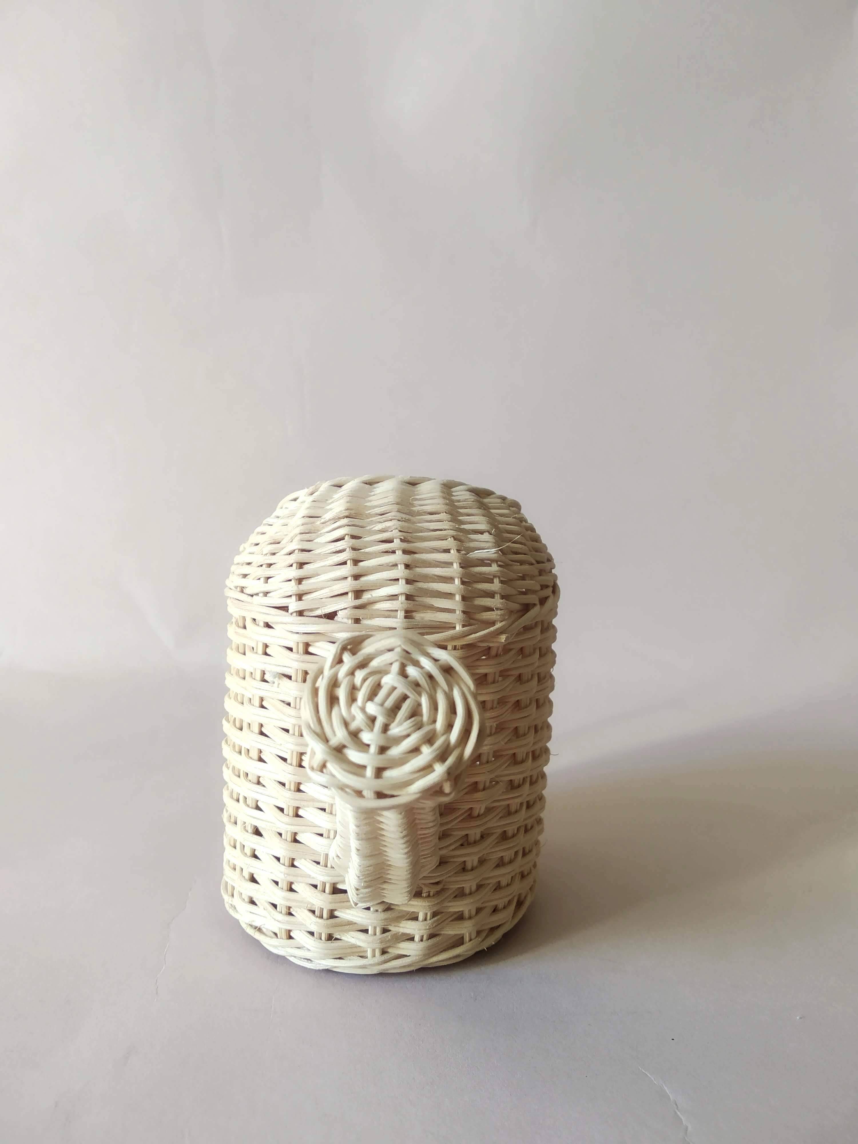 Miniature rattan watering can