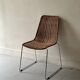 Chair made of rattan, wicker and chrome-plated metal